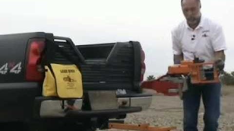 Lewis Winch skids heavy log.