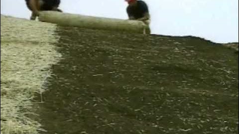 Erosion Control Blankets (ECBs) being placed over the GEOWEB® Geocells