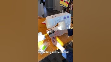 How to thread the top thread and bobbin on a Kenmore 385 sewing machine