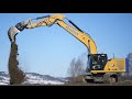 Isachsen Cat 330 Working on Road Project