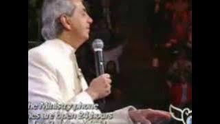 Benny Hinn sings 'There's Something About That Name'