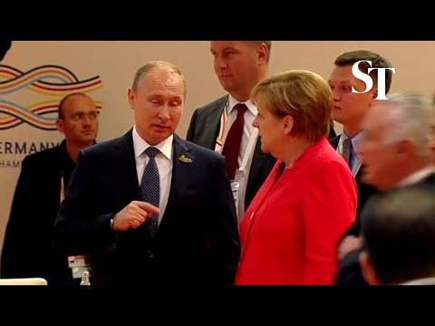 Angela Merkel gives Vladimir Putin epic eye roll