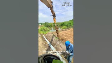 Mechanized operation of excavator drilling and planting utility poles saves time and effort