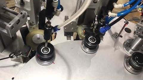 Automatic speaker gluing cover assembly machine