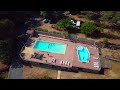 Ref:Of2gzMhwUp0 Camping du vignal zoom out du camping et de ses piscines
