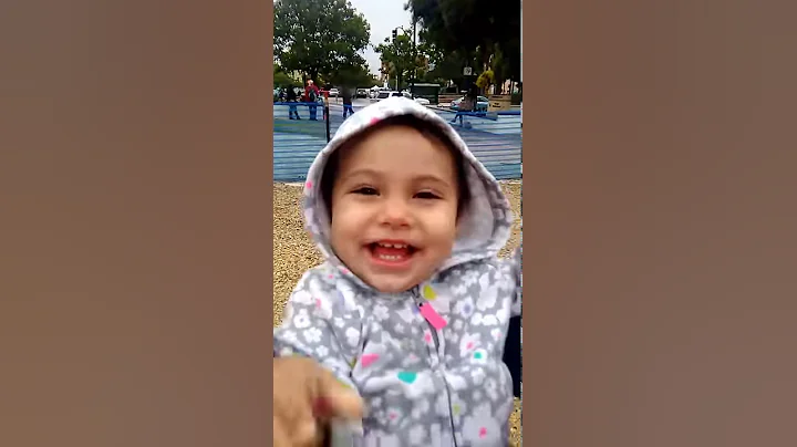 Palomita on the swing her first time.