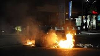 Trump win sparks riots across US as crowds burn American flag and chant 'Not our president'