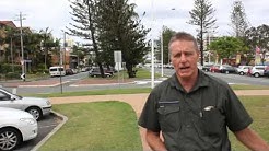 How did the QLD/NSW border create Twin Towns? 