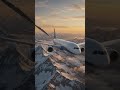 Airplane soaring over snowy mountains sunset. #aviation #mountains #sunset #flying