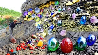 After a volcanic eruption, gold nuggets and emeralds grow in rocks cave.