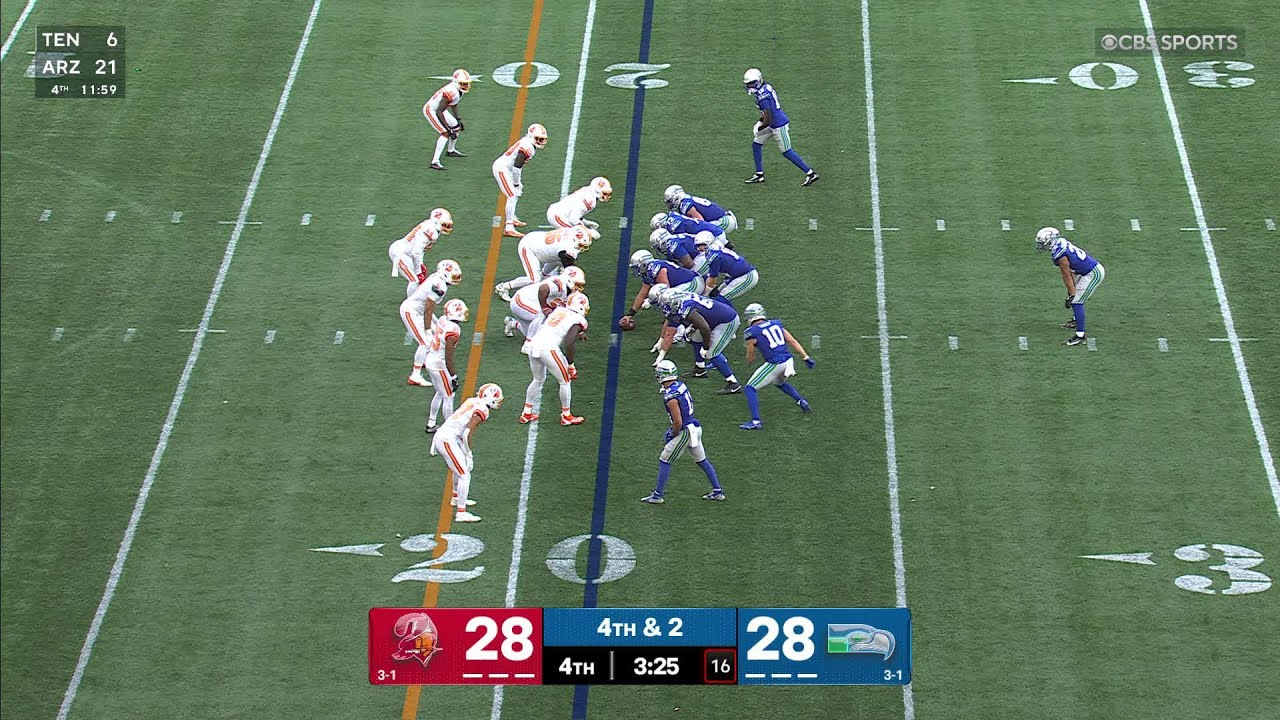 Sam Darnold escapes the pocket to find Tory Horton for the touchdown