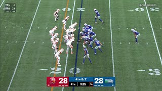 Sam Darnold escapes the pocket to find Tory Horton for the touchdown