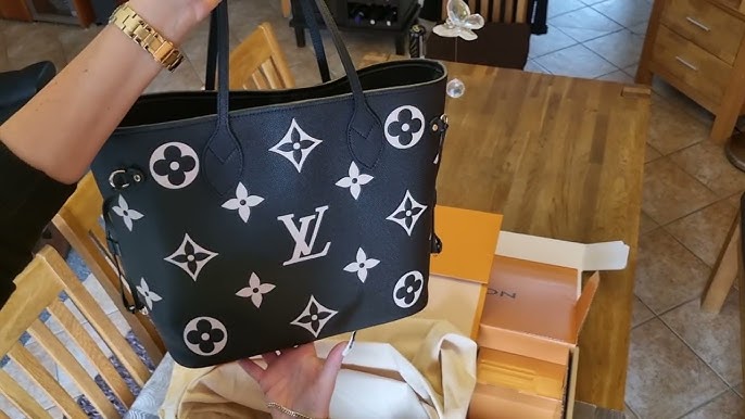 Louis Vuitton bag. Neverfull MM tote in Monogram Empreinte leather
