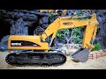 Unboxing HuiNa Toys RC Excavator 1550 15 Channel Remote Control and a Metal Bucket