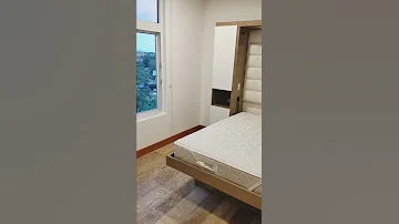 ¿Qué es una cama Murphy en un hotel?