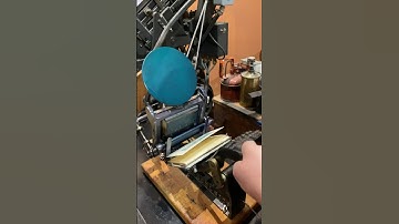 Making a red and green holiday print with a tabletop printing press