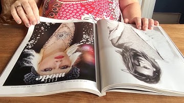 ASMR relaxed gentle page turning through magazines