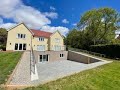 Selfbuild project with prefabricated basement and lowered courtyard providing extra living space