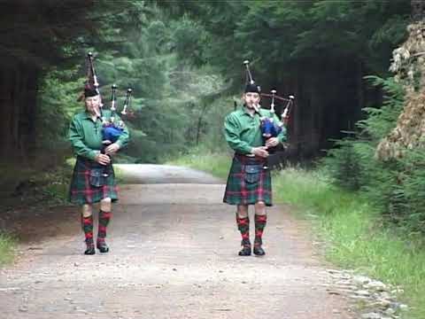 The MacNeils of Ugadale  -  Pipe Major Bill Hepburn & Pipe Major Bill Hepburn Jnr. in Borgie Forest.