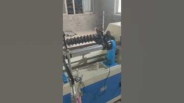 Multi-blade paper tube core cutting machine, automatic tube loading and discharging