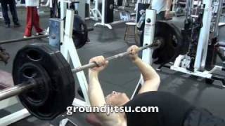 79 year old man doing heavy bench press
