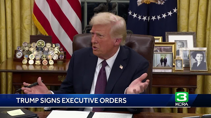 What executive orders did President Donald Trump sign on Day 1?