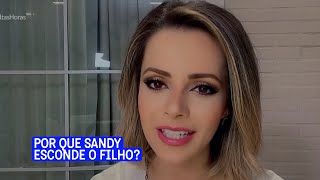 Why does Sandy hide her son so much?