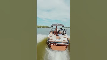 FPV DRONE FLYING BY A MALIBU BOAT