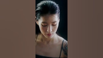 prowdmon monika showing off her tattoo