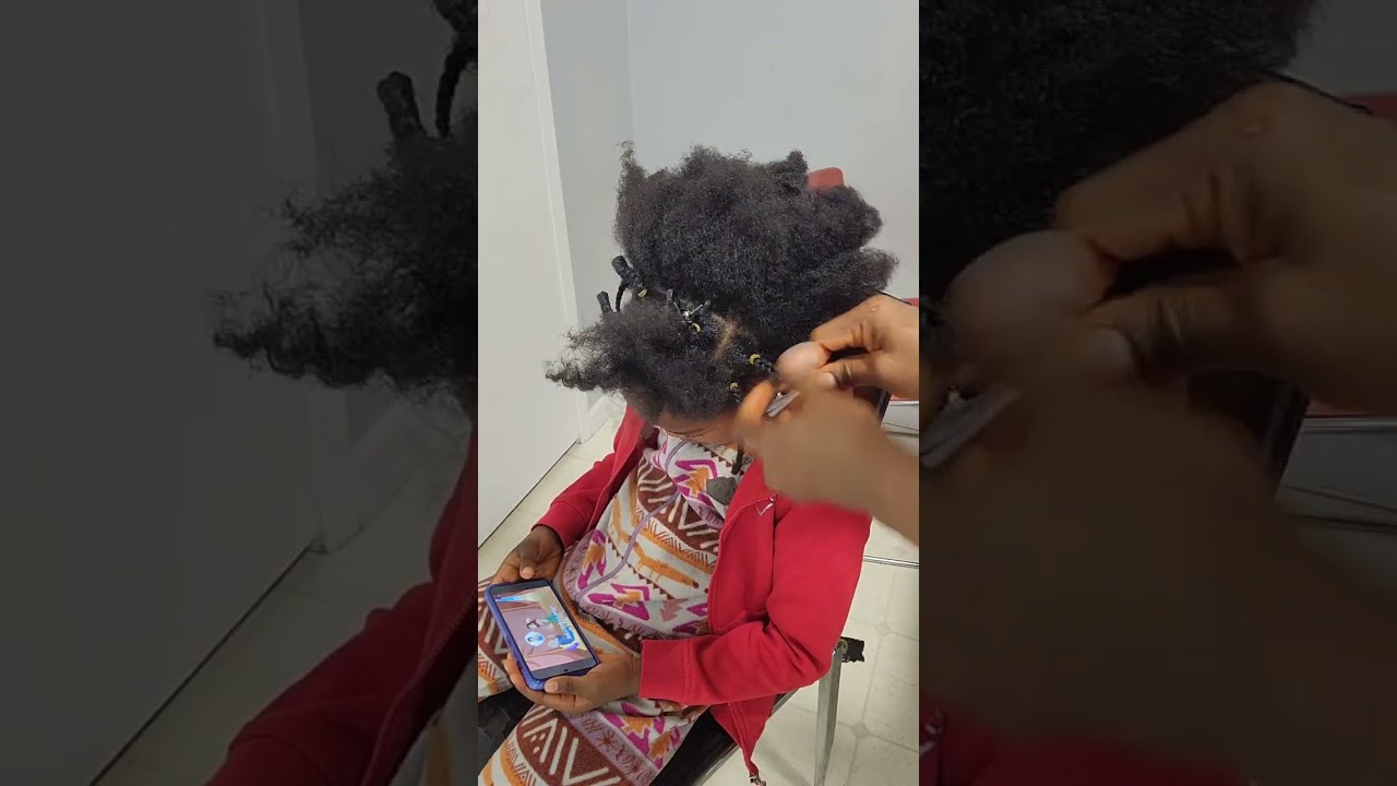 Messy bun hairstyle with natural hair for little girls 