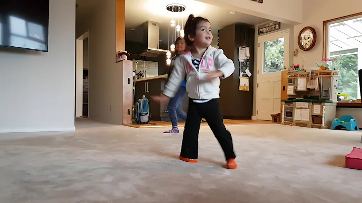Emmeline dancing to mama's piano