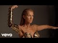 Behind-the-scenes of the Courage album photoshoot: Gold metal corset by Thierry Mugler