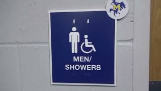 the Legacy Center Lake Charles men's Coach Locker Room and men's Showers