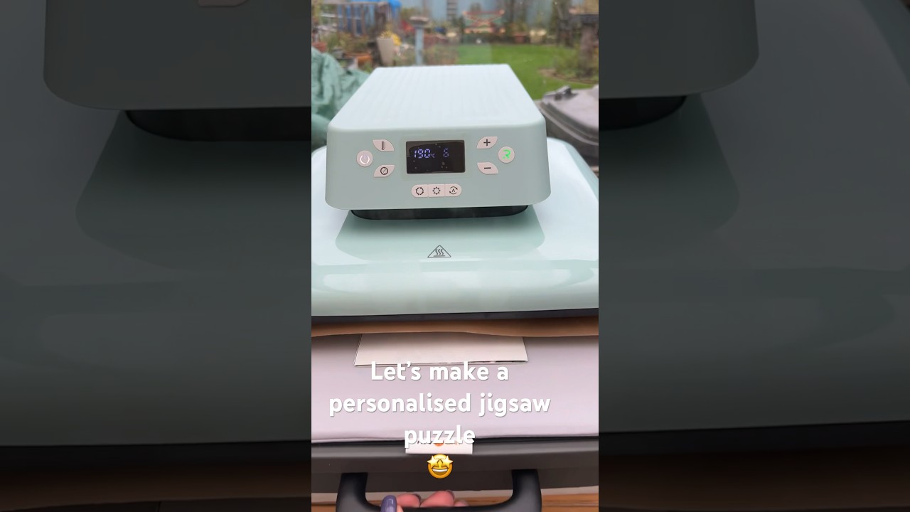 Sublimated Jigsaw puzzle using htvront automatic heat press. 