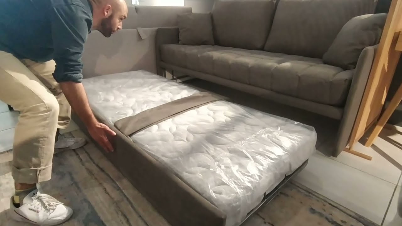 Ouverture d'un canapé lit gigogne de marque Dienne