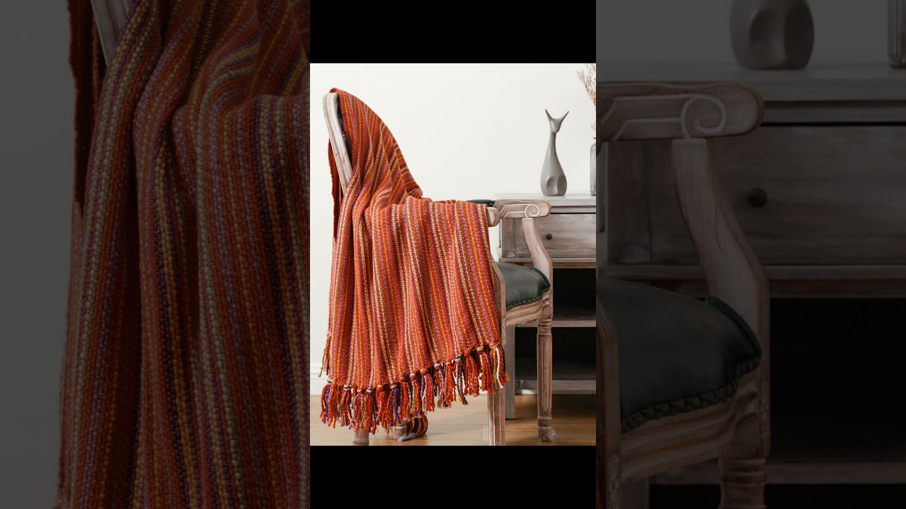 Let your space come alive with the playful charm of Variegated Tassel Throw in a rainbow of colors