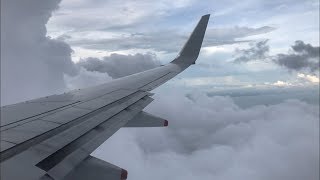 Landing in Singapore - Silk Air - Boeing 737-800. Low clouds on approach and crosswind on landing.