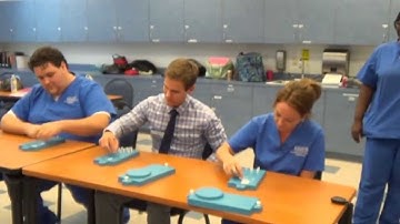 Medical Assisting Students Test Their Hands Speed and Dexterity