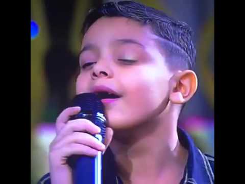 معكم مني الشاذلي أغنيه زي العسل بصوت الطفل احمد السيسي