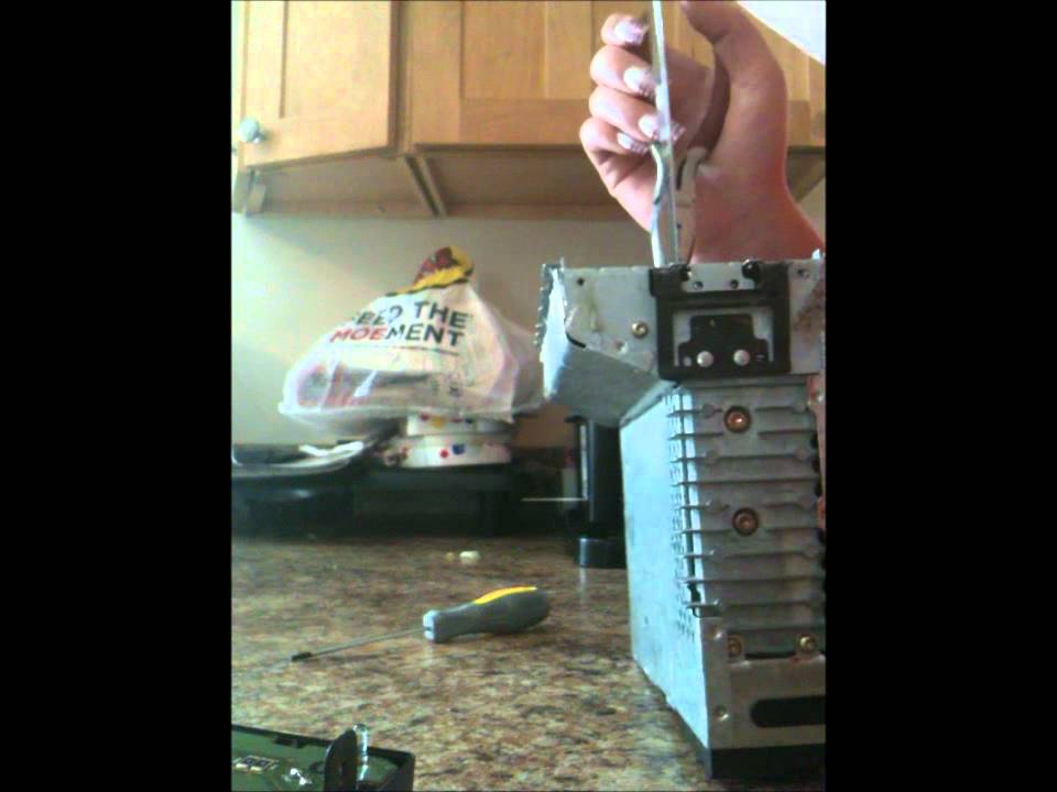 D.I.Y HOW TO REMOVE A CD OUT OF A FACTORY FORD RADIO YouTube