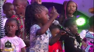 Young child singing BABA NI MAOMBI YANGU / Tuesday Worship Moments