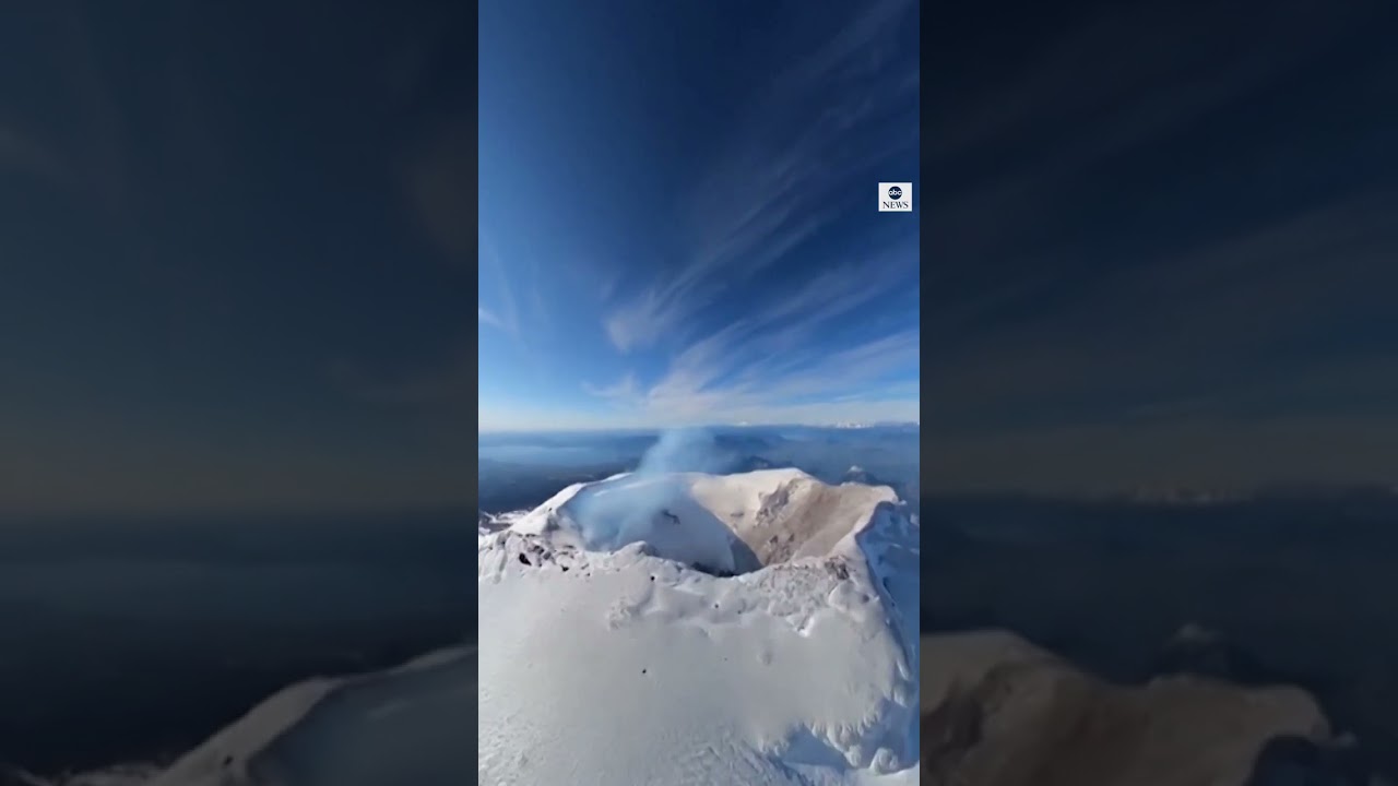 Wingsuit pilot files into active volcano | ABC News