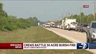 Crews work to contain 120-acre brush fire off Corkscrew Rd