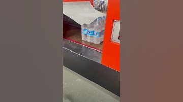Semi-automatic heat shrink machine!#water #heat shrink #packaging #pack