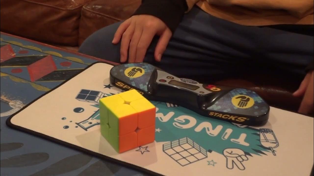 Using my friend's stackmat timer and Tingman cube mat to time myself