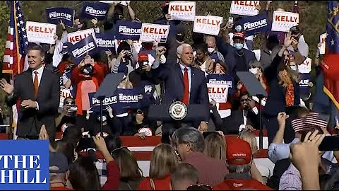 Pence campaigns for David Perdue, Kelly Loeffler i...