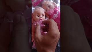 boneka dot bisa menangis