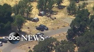 Man charged with killing father while he was camping with 2 daughters