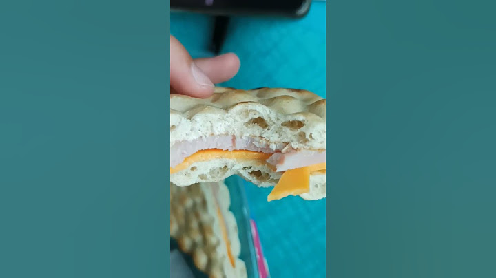 Testing a cheddar and ham supermarket sandwich. I can say it was delicious and just what I needed.