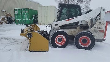 Bobcat A770 with hla snow wing